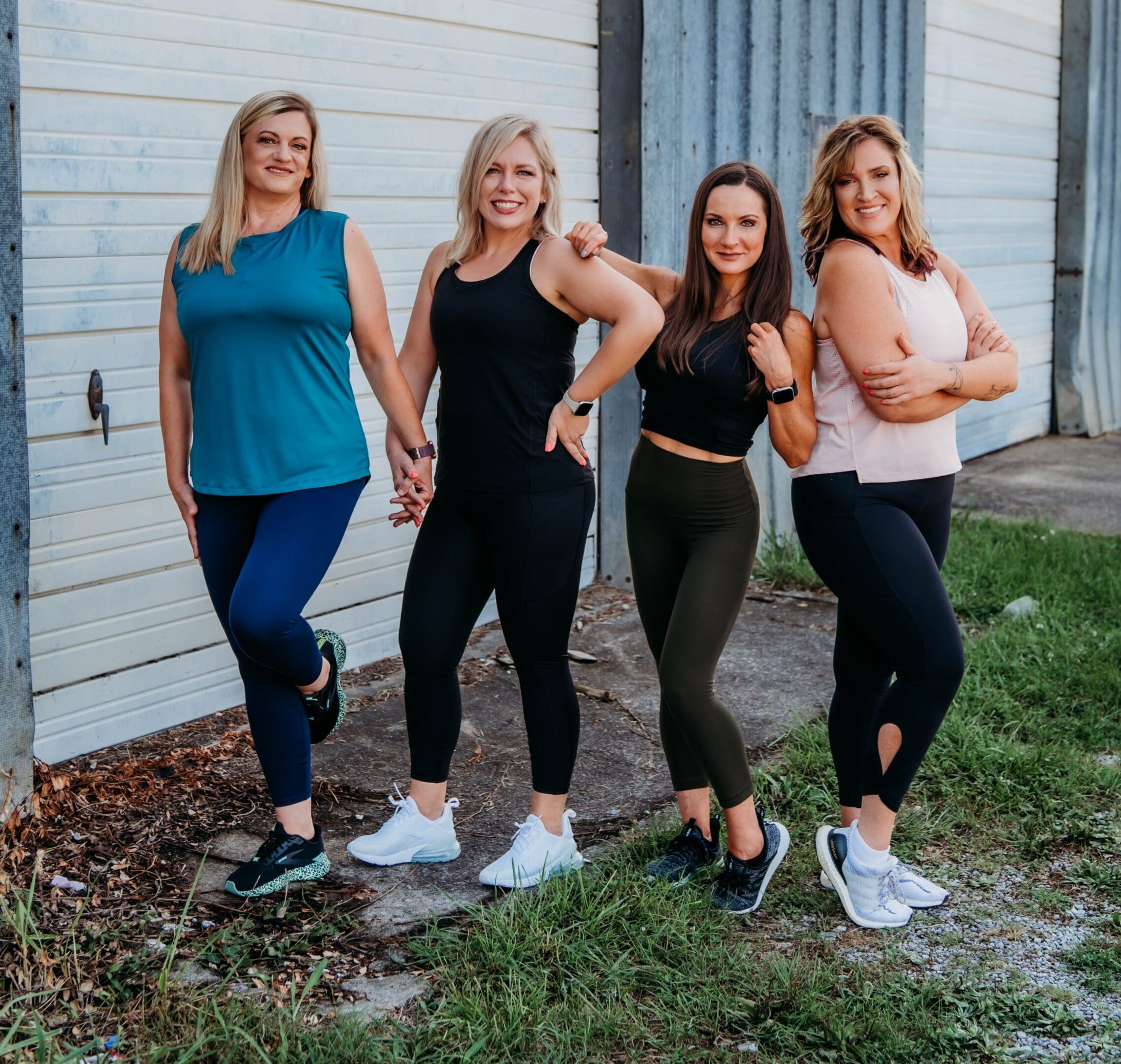 A group of women standing next to each other.